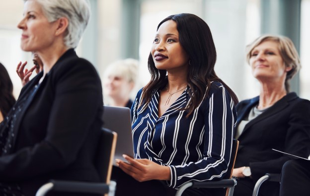 People in meeting audience